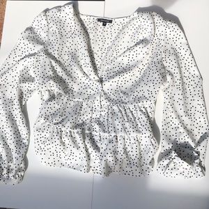 White and black polka dot blouse